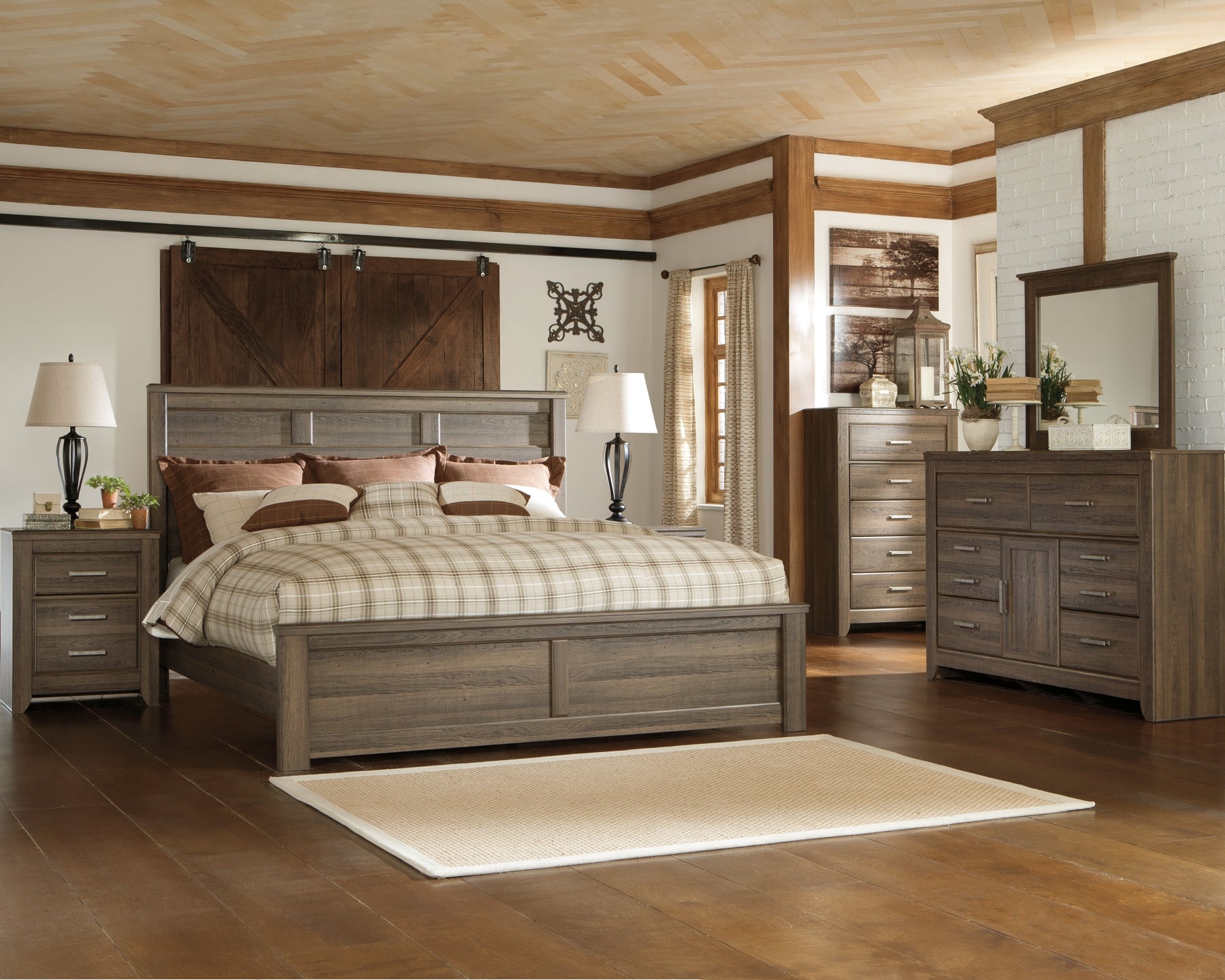 Juararo King Panel Bed with Mirrored Dresser, Chest and 2 Nightstands at Walker Mattress and Furniture Locations in Cedar Park and Belton TX.