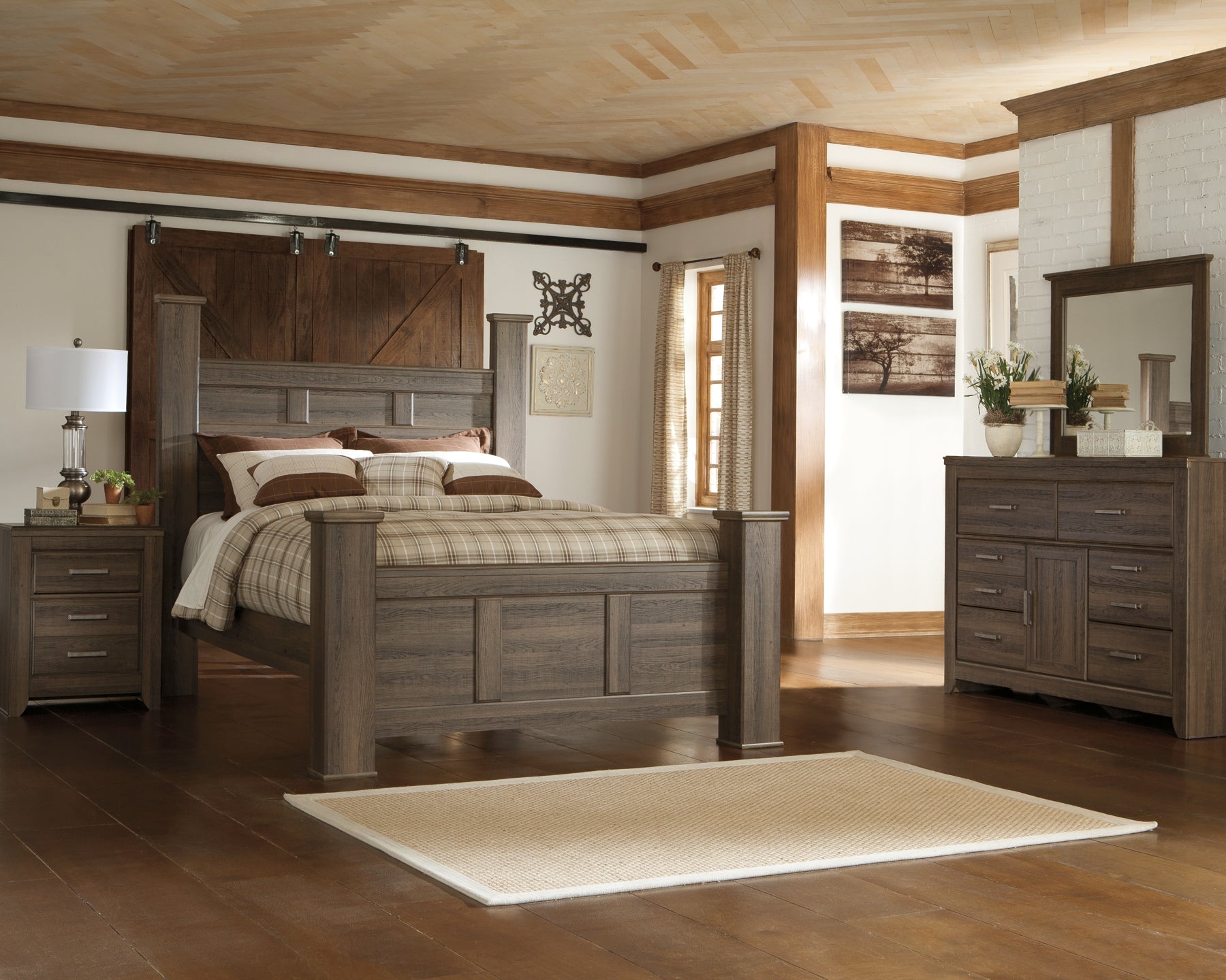 Juararo Queen Poster Bed with Mirrored Dresser at Walker Mattress and Furniture Locations in Cedar Park and Belton TX.