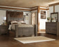 Juararo Queen Poster Bed with Mirrored Dresser at Walker Mattress and Furniture Locations in Cedar Park and Belton TX.
