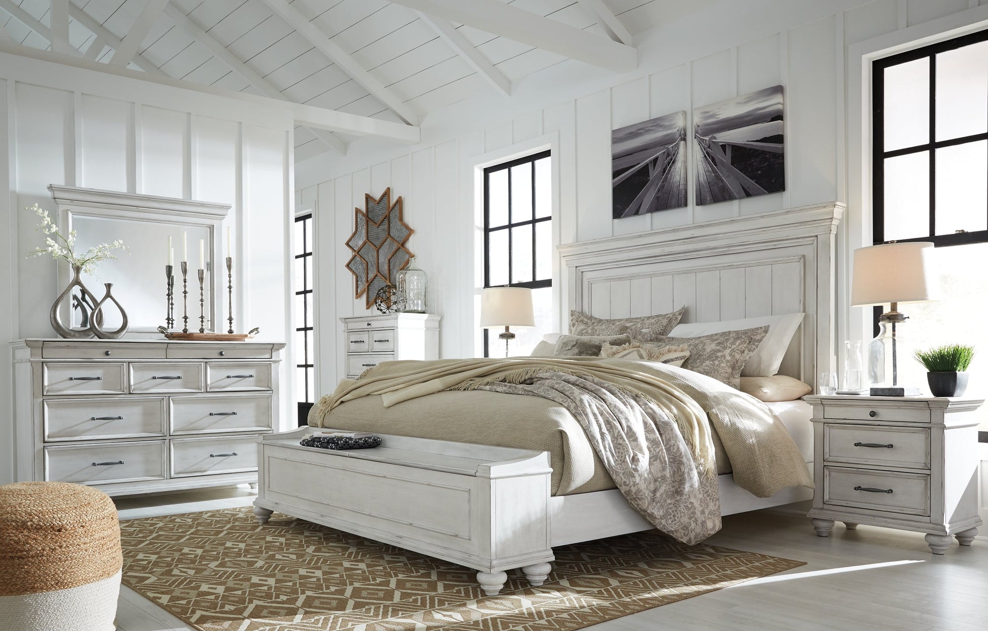 Kanwyn King Panel Bed with Storage with Mirrored Dresser, Chest and Nightstand at Walker Mattress and Furniture Locations in Cedar Park and Belton TX.