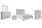 Kanwyn King Panel Bed with Storage with Mirrored Dresser, Chest and Nightstand at Walker Mattress and Furniture Locations in Cedar Park and Belton TX.