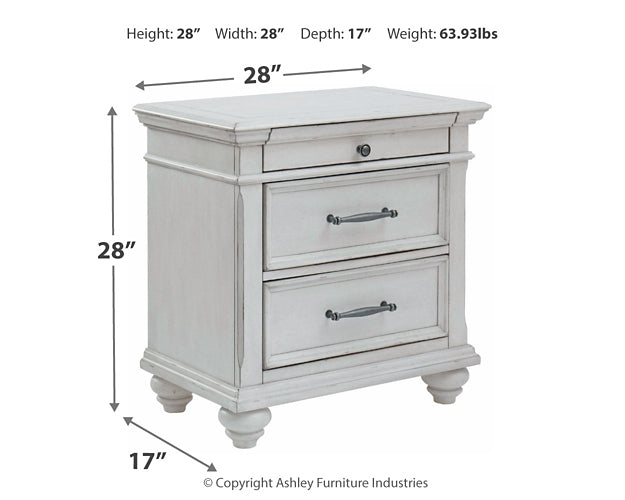Kanwyn King Panel Bed with Storage with Mirrored Dresser, Chest and Nightstand at Walker Mattress and Furniture Locations in Cedar Park and Belton TX.