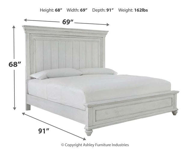 Kanwyn Queen Panel Bed with Mirrored Dresser, Chest and 2 Nightstands at Walker Mattress and Furniture Locations in Cedar Park and Belton TX.