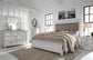 Kanwyn Queen Panel Bed with Mirrored Dresser and 2 Nightstands at Walker Mattress and Furniture Locations in Cedar Park and Belton TX.