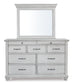 Kanwyn Queen Panel Bed with Storage with Mirrored Dresser and Chest at Walker Mattress and Furniture Locations in Cedar Park and Belton TX.