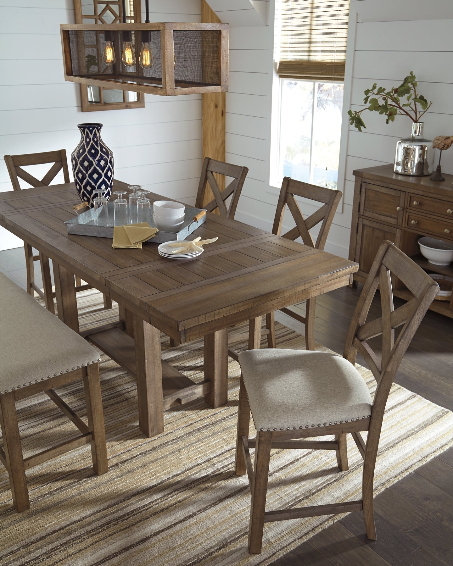 Moriville Counter Height Dining Table and 4 Barstools with Storage at Walker Mattress and Furniture Locations in Cedar Park and Belton TX.