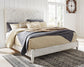 Paxberry King Panel Bed with Mirrored Dresser, Chest and 2 Nightstands at Walker Mattress and Furniture Locations in Cedar Park and Belton TX.