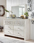 Paxberry Queen Panel Bed with Mirrored Dresser and Chest at Walker Mattress and Furniture Locations in Cedar Park and Belton TX.