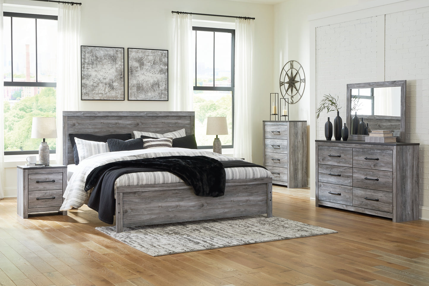 Bronyan King Panel Bed with Mirrored Dresser, Chest and 2 Nightstands